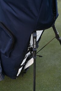 Water resistant golf bag cover by Over Armor Golf standing on golf course