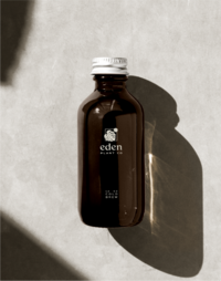 Dark bottle with custom branding for Eden Plant Co - Marrow Design