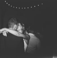 bride and groom laughing