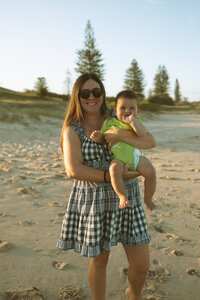 Mother and Son on Lennox Head Beach at Sunset