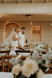 Bride + Groom seeing the reception styling for the first time at Gabbinbar Homestead