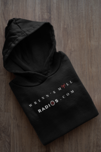 mockup-of-a-folded-customizable-hoodie-placed-on-a-wooden-surface-33874a