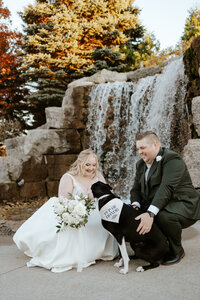 whistlebear wedding photographer of couple on wedding day in with their dog  