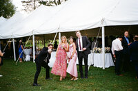 Candid guest portrait at a tented wedding in Central PA countryside