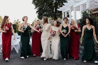 bridesmaids in red - bridesmaids in green - slytherin and gryffindor wedding