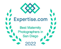 Badge for Expertise.com, reads "Best Maternity Photographer in San Diego 2022"