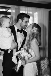 Bride and groom walk up memorial steps at their DC wedding