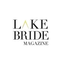 Log with text "Lake Bride Magazine"