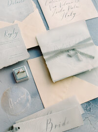 Pastel blue wedding stationery flatlay