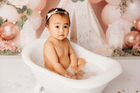 Auckland photographer michelle kelly's first birthday cakesmash photos of Ammika