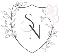 victorian crest logo with pink butterfly