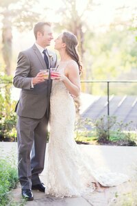 Bride and groom toasting