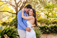 "Engagement portrait of couple in Landfall Temple Gardens"