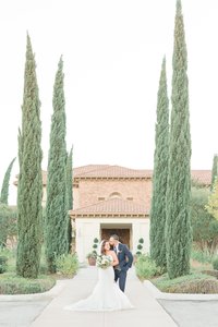Bride and groom walk up memorial steps at their DC wedding