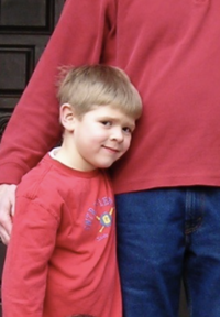 Childhood picture of Nate in red shirt