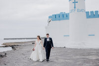 couple-walking-in-pier-in-mayo