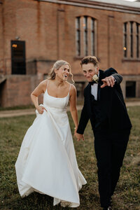 mand and woman wedding in the rain