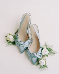 Close-up of delicate light blue wedding shoes from Anthropologie, styled as fine art wedding details and beautifully captured by Jessica Leigh Photography.