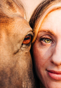 woman and horse's eye side by side