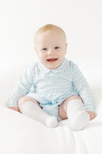 studio milestone photo for 9 month old baby boy