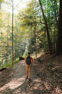 WanderlustinOhio walking along a wooded trail during a challenging hike at North Chagrin Falls.