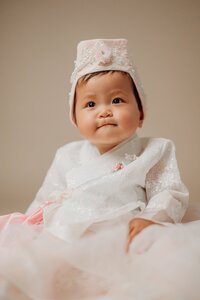 little girl dancing around a photography studio