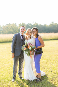 Eleanor Stenner with bride and groom at Birmingham wedding 