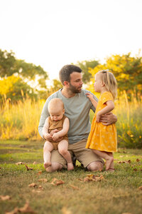 family embracing and smiling