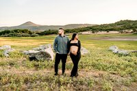 Expecting Family Looking Opposite Ways | Photography by Jocelyn