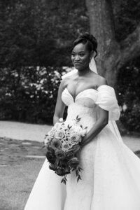 A bride walking down the aisle in her Alonuko wedding dress in Atlanta, GA