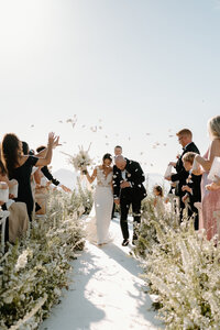 bride and groom walking down the aisle