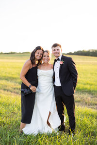 Eleanor Stenner with bride and groom at Birmingham wedding 