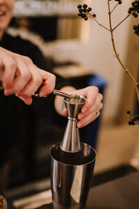 A picture of a cocktail being made.