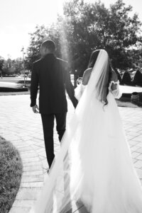 A couple leaving their wedding ceremony at the Chapel on McEver in Georgia