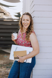 Katie Reichert, founder of Reichert Creative, smiling confidently—representing her expertise in digital marketing, email list growth, and small business branding.