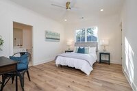 Bedroom with newly installed hardwood.