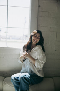 boise photographer Erica Rochelle holding a film camera