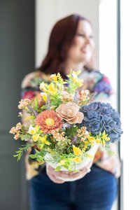 Elegant brand photography for social media featuring a vibrant bouquet of flowers to enhance brand visuals