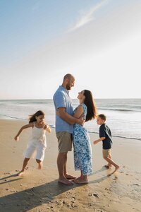 Jacksonville Beach Family Session during Sunrise by Phavy Photography, Jacksonville Family Photographer