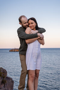 bride and groom embracing taken by Minnesota wedding photographer Marcus Hanenburg Photography
