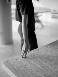 house-franc-emily-lauren-interiors-portrait-ruet-photo-film-photography-gallery-rath-vintage-furniture-wood-table-plaster-black-outfit-minimal-austin-texas