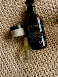 This image features spa-quality skincare products used at Book Sothana, a premier day spa located at 9303 Baymeadows Rd 105, #120, Jacksonville, FL 32256. Each skincare and body care product is carefully selected by licensed esthetician Sothana to provide optimal results for facials, waxing treatments, and beauty therapies. At Book Sothana, we prioritize using high-quality, professional-grade skincare solutions to support our clients’ natural beauty and skin health. This flat lay captures the attention to detail and commitment to quality that defines every service we offer. Clients at Book Sothana trust us for personalized care that goes beyond the surface. Call (904) 597-0867 to schedule your skincare consultation, or visit https://booksothana.com/ to explore all beauty services. Experience the luxury of intentional beauty care in a serene, professional environment at Jacksonville’s trusted day spa.