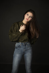model poses for a studio photography session  photo by Jessica Stewardson