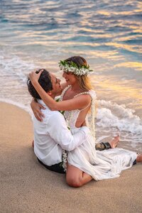 Couple portrait on Kukio beach taken by photographer in Kona Hawaii