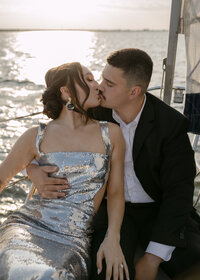 Maci and Ryan wanted their engagement to feel unique and chic. From her silver sequin dress to the sailboat that carried them into the sunset, their engagement was nothing short than perfect.