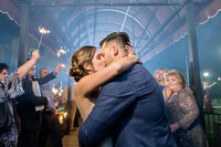 sparkler-exit-bride-and-groom-kissing-grand-exit-Monterey-California