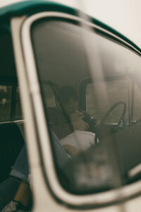 Creative couples photo in a truck