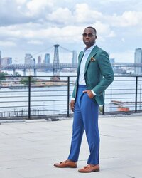 Bold green and blue suit for a standout, modern look