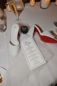 Bridal shoes and wedding invitations, beautifully captured by Priscila Del Cristo, wedding photographers in Tampa.