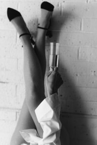 Stylish and empowering boudoir portrait for a woman turning 50 in Clovis.